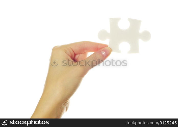 puzzle in hands isolated on white background