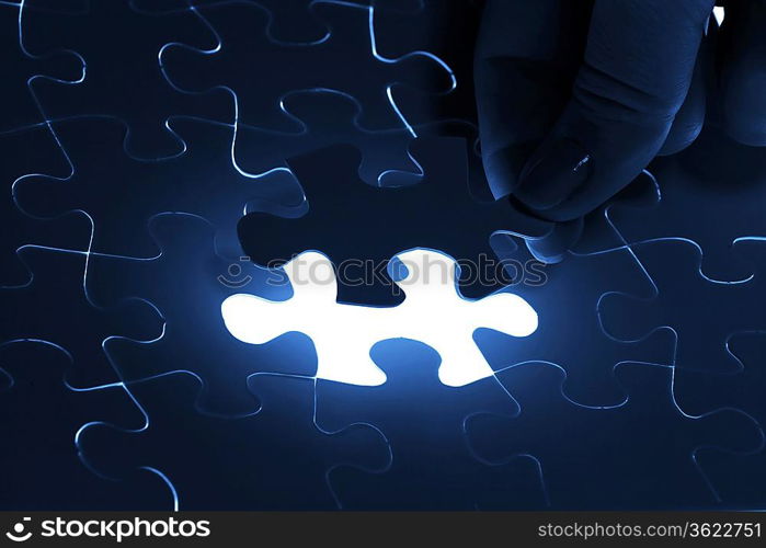 puzzle piece coming down into its place