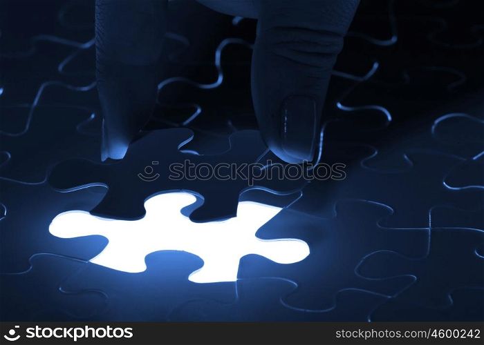 Puzzle pieces. puzzle piece coming down into its place