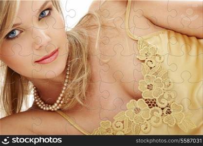puzzle portrait of mysterious blue-eyed blond in pearls
