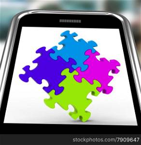 . Puzzle Square On Smartphone Shows Unity And Teamwork