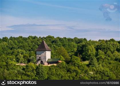 Pyatnychany tower  defense structure, 15th century  on forest hill slope, Lviv Region, Ukraine.