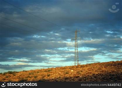 Pylon with electrical wire and field