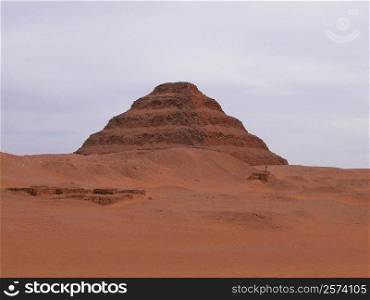 Pyramid in an arid landscape, The Step Pyramid Of Zoser, Saqqara, Egypt