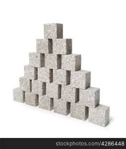 Pyramid made of small granite rock blocks.