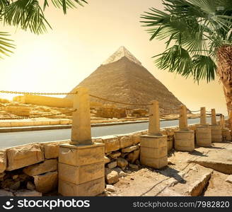 Pyramid of Khafre and asphalted road with columns