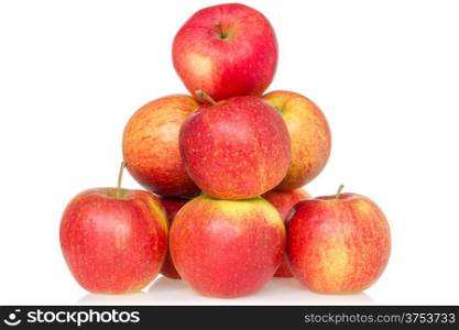 Pyramid of red apples isolated on white background