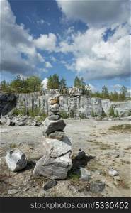 Pyramid of stones in a marble canyon. . Pyramid of stones in a marble canyon. Small Zen out of pile of stones