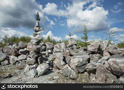 Pyramid of stones in a marble canyon. Small Zen out of pile of stones