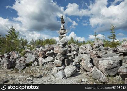 Pyramid of stones in a marble canyon. Small Zen out of pile of stones