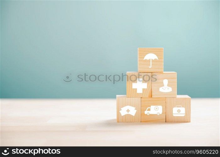 Pyramid-shaped wooden cubes, a metaphor for healthcare and insurance. Atop, a medical insurance icon conveys safety. Blue backdrop with copyspace for Health Insurance message.