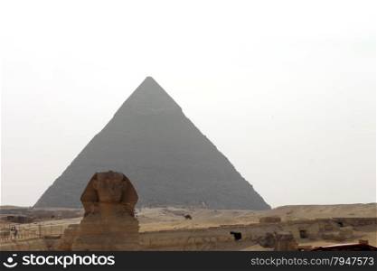 Pyramids In Desert Of Egypt And Sphinx In Giza
