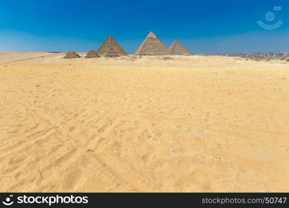 pyramids with a beautiful sky of Giza in Cairo, Egypt.