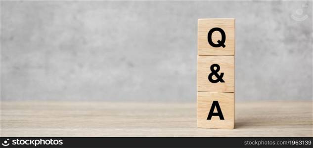 Q and A word with wooden block. FAQ( frequency asked questions), Answer, Question Ask, Information, Communication and Brainstorming Concepts