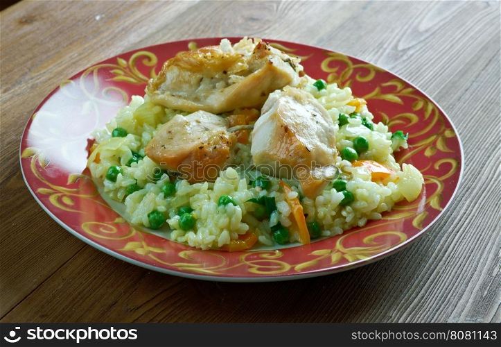 Qatami Brinjit fried chicken with rice and vegetables. Georgian cuisine