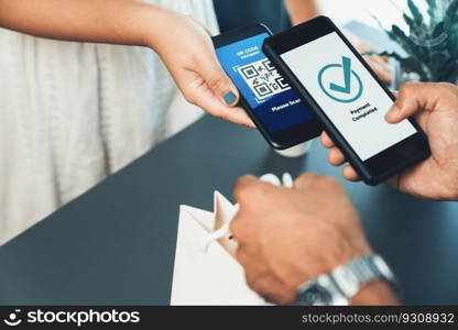 QR code displayed on screen for cashless payment scanning. Closeup hands hold smartphone to transfer money by electronic transaction from mobile app. Bar code technology for fast payment. Fervent. QR code is displayed on screen for cashless payment scanning. Fervent