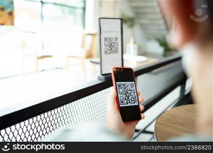 Qr code payment. E wallet. Man scanning tag accepted generate digital pay without money.scanning QR code online shopping cashless payment and verification technology