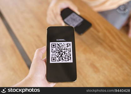 Qr code payment. E wallet. Man scanning tag accepted generate digital pay without money.scanning QR code online shopping cashless payment and verification technology concept