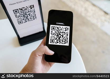 Qr code payment. E wallet. Man scanning tag accepted generate digital pay without money.scanning QR code online shopping cashless payment and verification technology concept