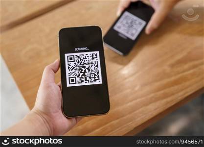 Qr code payment. E wallet. Man scanning tag accepted generate digital pay without money.scanning QR code online shopping cashless payment and verification technology concept