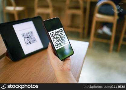 Qr code payment. E wallet. Woman scanning QR code online shopping cashless technology concept