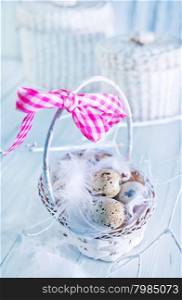 quail eggs in basket and on a table