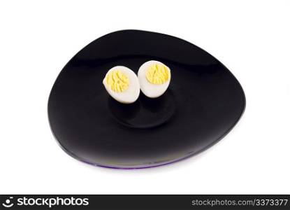 quail eggs on a plate isolated on white
