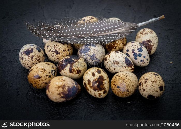 quail eggs on dark old background