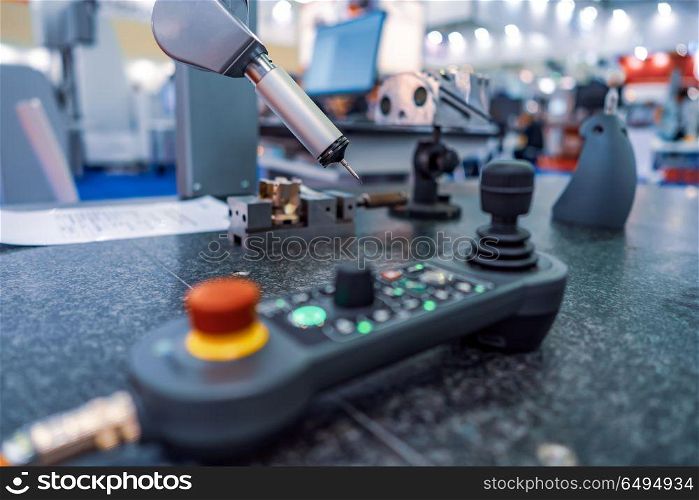 Quality control measurement probe. Metalworking CNC milling mach. Quality control measurement probe. Metalworking CNC milling machine. Cutting metal modern processing technology. Small depth of field. Warning - authentic shooting in challenging conditions.