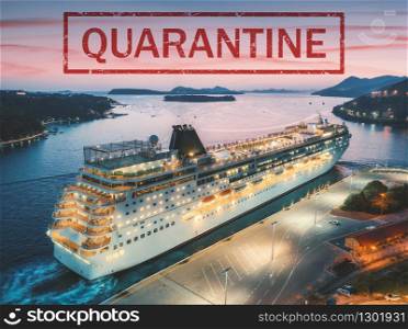 Quarantine in cruise ship because of pandemic of coronavirus. Cancelled travel in cruise liner. Holidays cancellation because of epidemic of Covid-19. Crisis in the cruise industry. Aerial. Red text