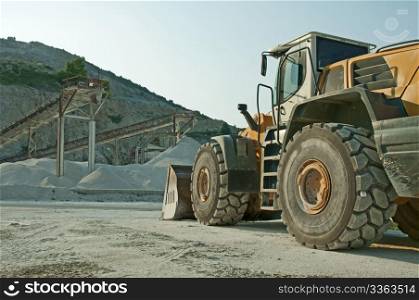 Quarry and Bulldozer. Vertical image