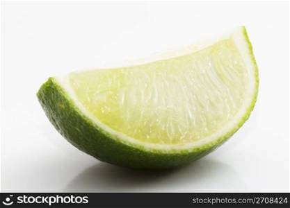 quarter lime diagonal. quarter lime diagonal on white background