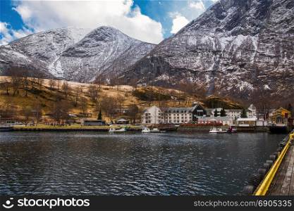 Quay fjord with mountains in the background in the Norwegian town of Flam
