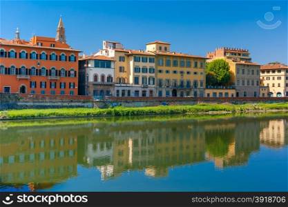 Quay of the river Arno in Florence, Bell Tower Basilica di Santo Spirito on the background, Tuscany, Italy