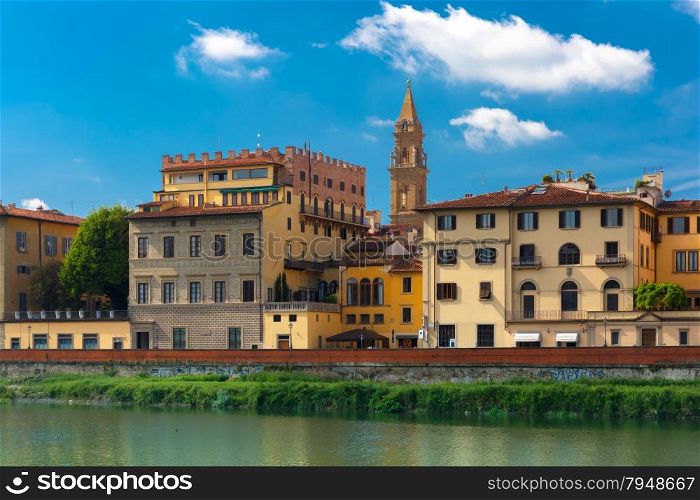 Quay of the river Arno in Florence, Bell Tower Basilica di Santo Spirito on the background, Tuscany, Italy