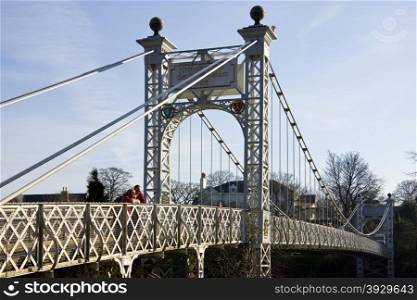 Queens Park Footbridge over the River Dee at Chester in the county of Cheshire in the United Kingdom