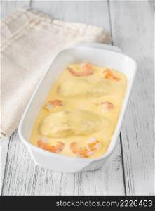 Quenelle - creamed fish mixture with Hollandaise sauce