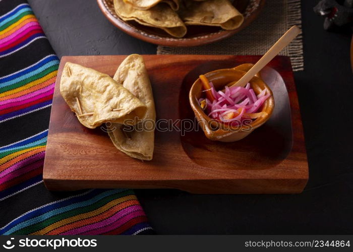 Quesadillas Doradas. Fried quesadillas made with corn tortillas, they can be filled with any dish or ingredient, such as meat, potato or fish such as marlin or tuna, popular during the Lenten season.