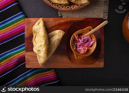 Quesadillas Doradas. Fried quesadillas made with corn tortillas, they can be filled with any dish or ingredient, such as meat, potato or fish such as marlin or tuna, popular during the Lenten season.