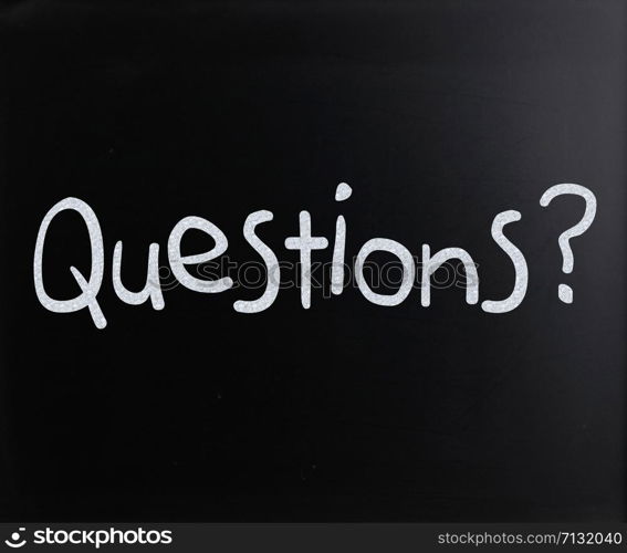 ""Question" handwritten with white chalk on a blackboard"