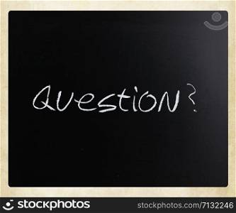 ""Question" handwritten with white chalk on a blackboard."