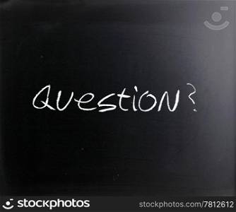 ""Question" handwritten with white chalk on a blackboard."