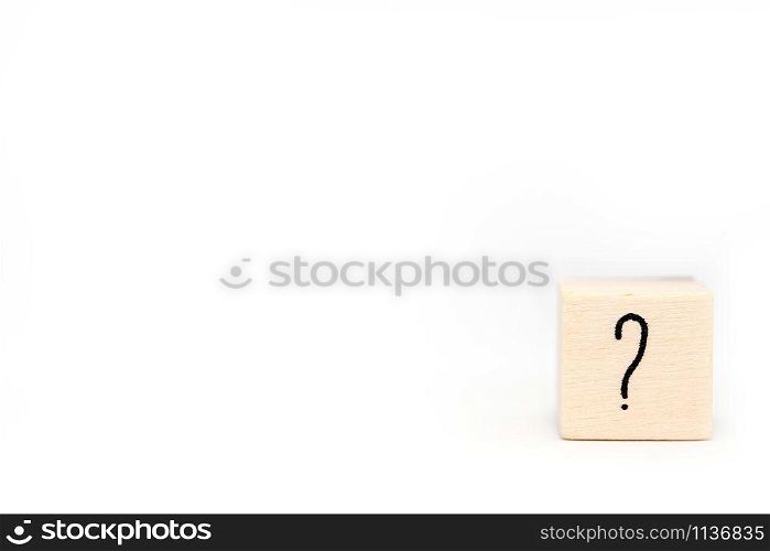 question mark on wood cube isolated on white background, symbol space for text close-up. question mark on wood cube isolated on white background, symbol space for text