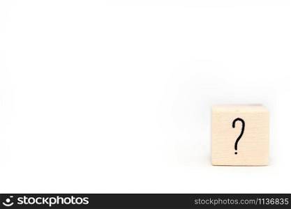 question mark on wood cube isolated on white background, symbol space for text close-up. question mark on wood cube isolated on white background, symbol space for text