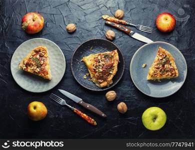 Quiche, an open French pie stuffed with apples and cheese.. French apple tart.