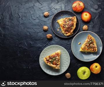 Quiche, an open pie stuffed with apples and cheese. Space for text. Apple tart, copy space