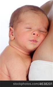 Quiet baby resting on the lap of his mother isolated on a white background