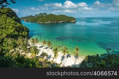 Quiet turquoise beach surrounded by islands