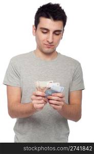quiet young man looking at his money, euro bills (isolated on white background)