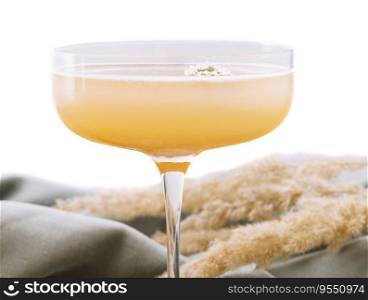 quince cocktail in a glass isolated